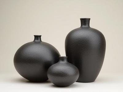 Thumbnail of 'Volcanic Glaze Vases' series, showcasing textured, dark ceramic pieces.