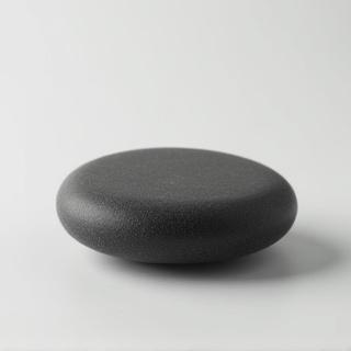 Pebble-shaped dark meditation stone